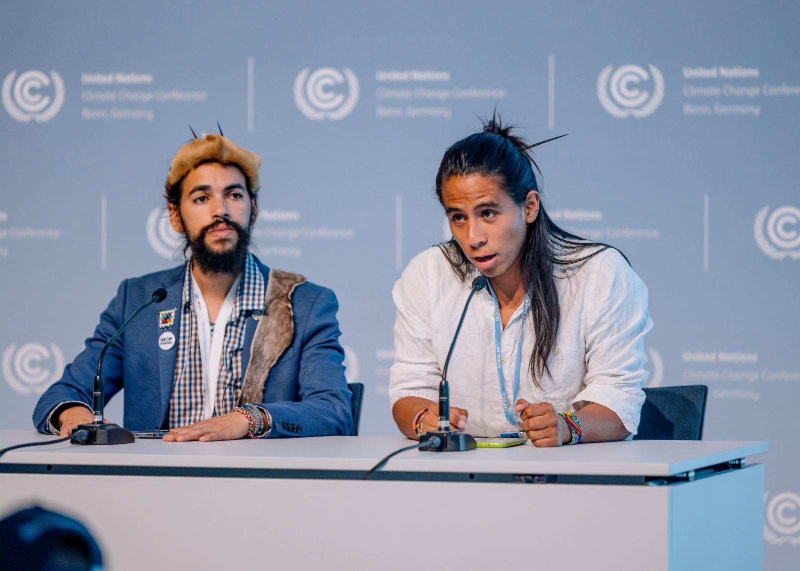 Two young speakers at a press conference at the UN Climate Change Conference in Bonn