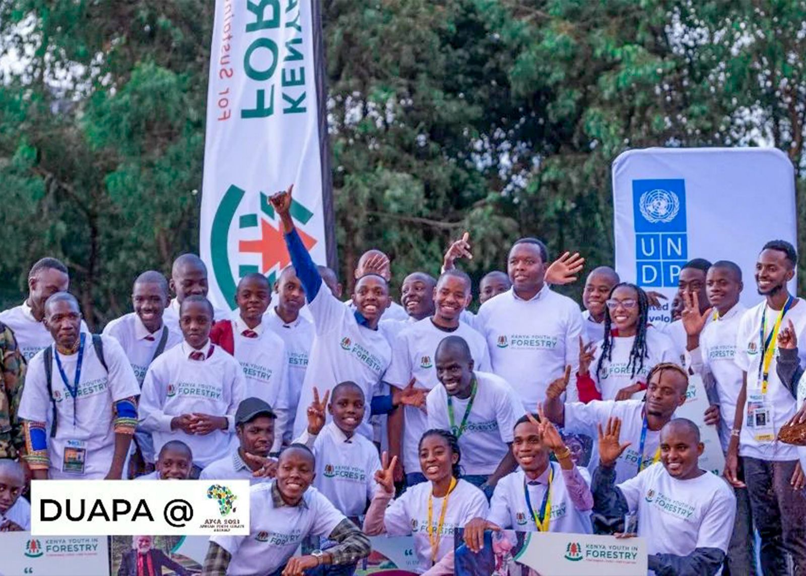 Group photo of young people in Kenya Youth in Forestry T-shirts, captioned 'DUAPA @ AYCA'