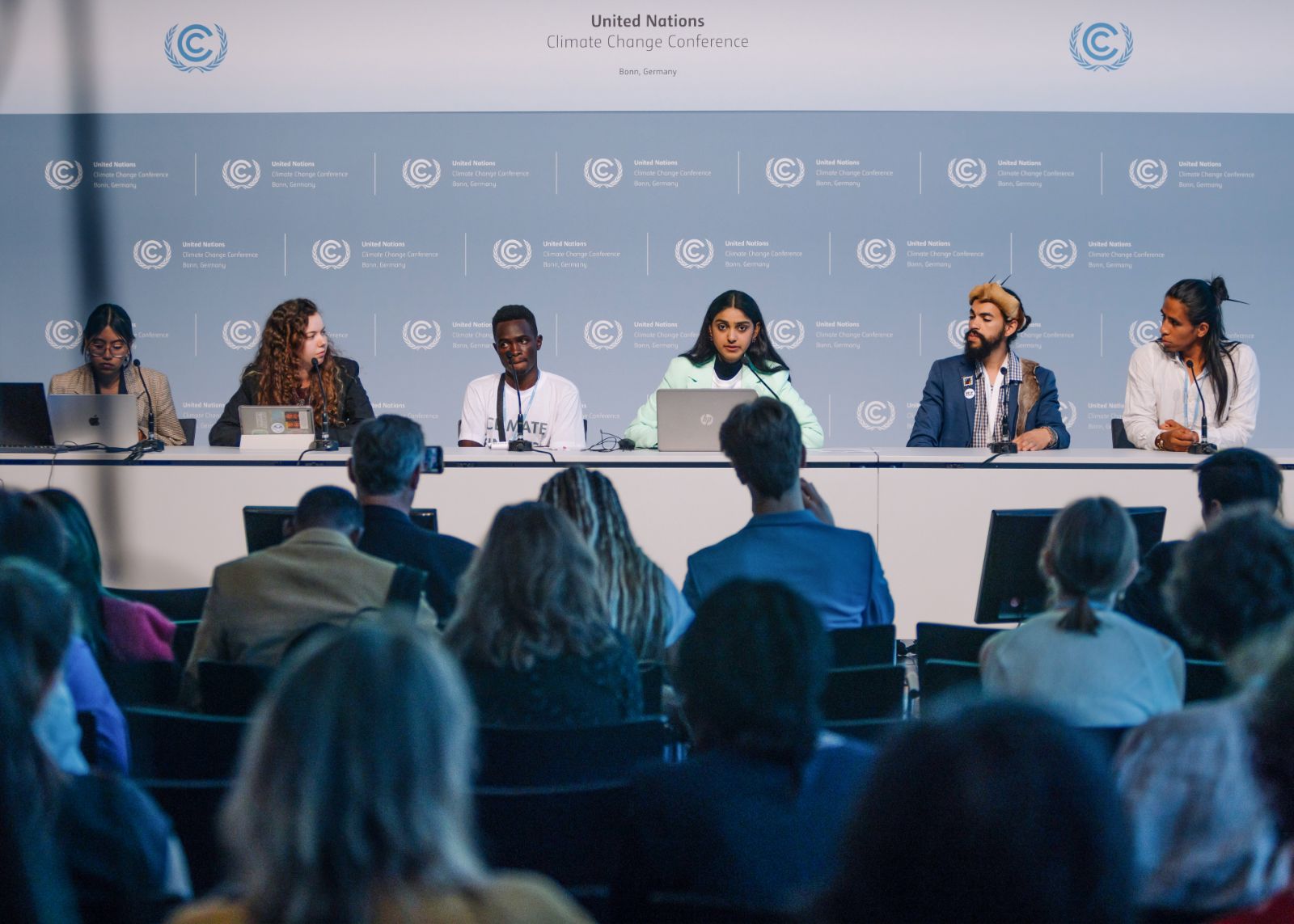 Six young panellists face an audience at the UN Climate Change Conference in Bonn